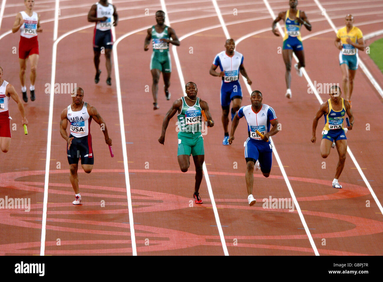 A general view of the action at the last stage of the race where Great Britain's Mark Lewis-Francis beats USA's Maurice Greene (silver) and Nigeria's Deji Aliu (bronze) to the gold medal Stock Photo