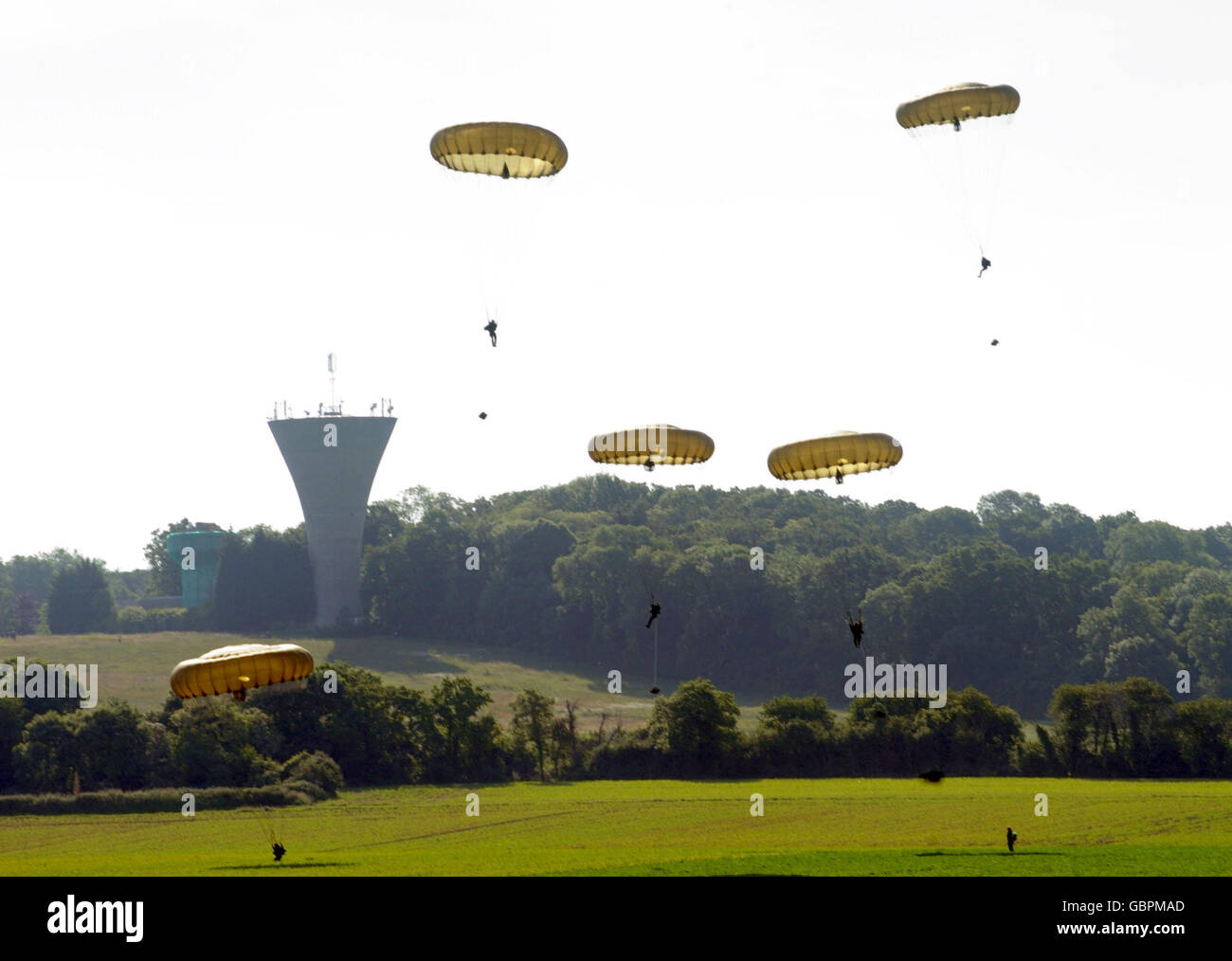 3 Para perform a parachute drop at Pegasus Memorial, in Ranville, Normandy, to mark the 65th anniversary of the D-Day landings. Stock Photo