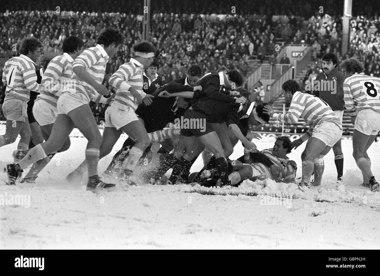 A three-inch blanket of snow covers the Twickenham pitch for the 100th Varsity match between Oxford University and Cambridge University, watched by Prince Andrew making his first solo public engagement. Stock Photo