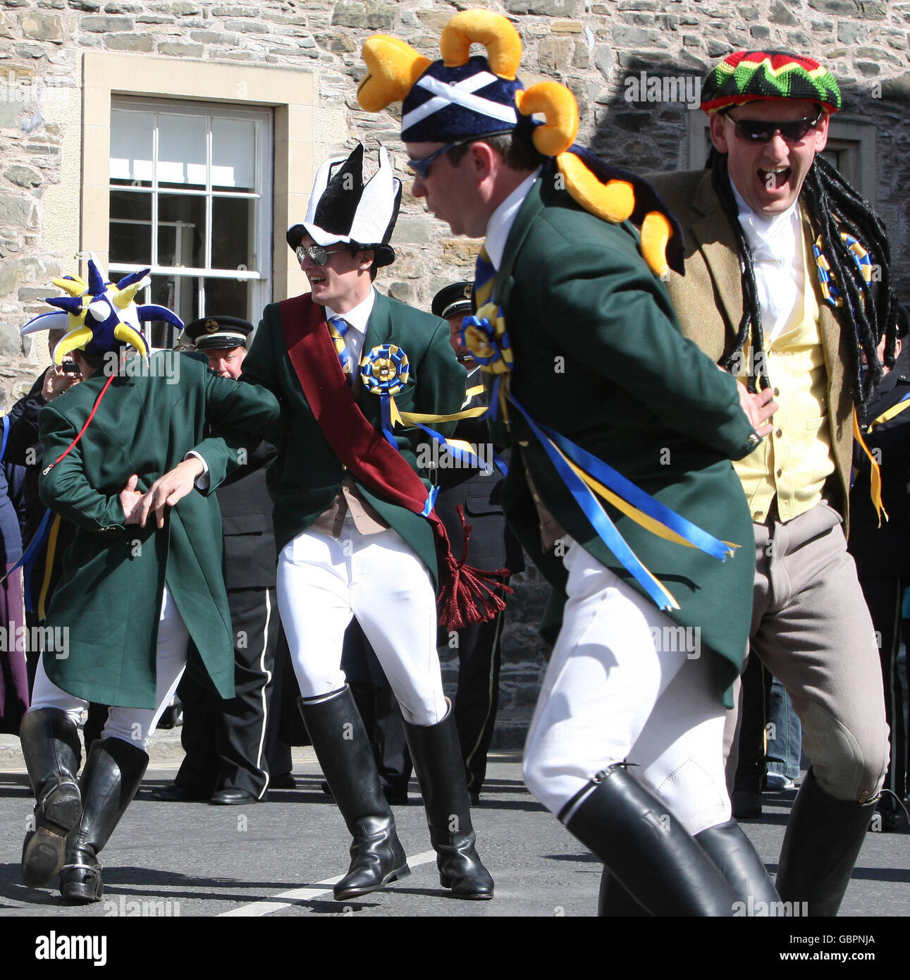 Hawick Common Riding Jamie Richardson (wearing red sash) takes