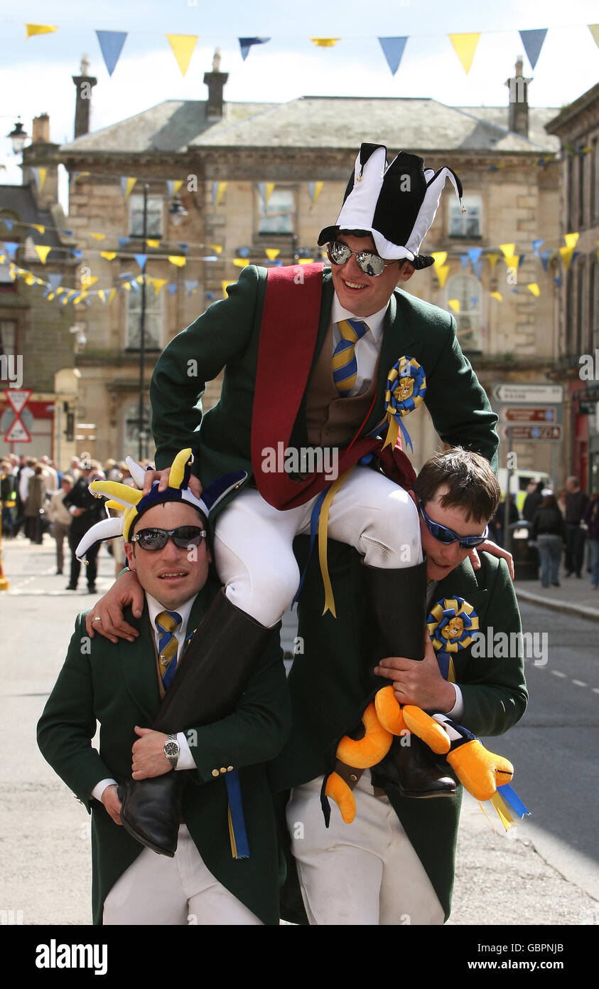 Hawick Common Riding Jamie Richardson (wearing red sash) is carried down Hawick High