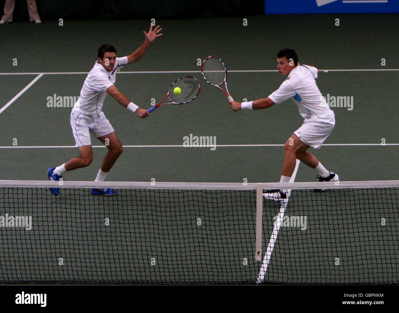 Great Britain's Colin Fleming (l) returns the shot watched by double's ...
