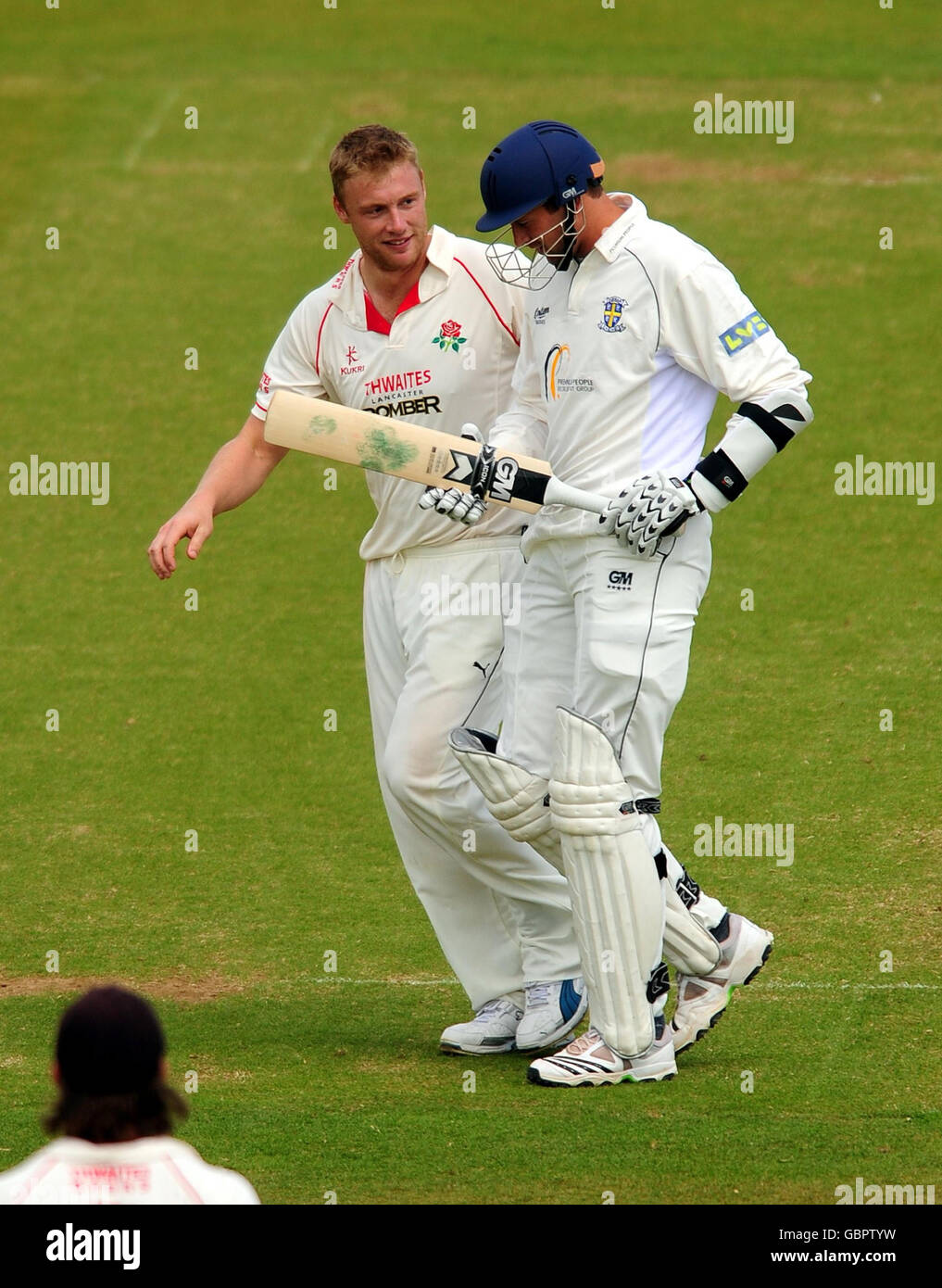 Lancashire's Andrew Flintoff celebrates taking the wicket of Durham's Steve Harmison (right) during the LV County Championship match at Riverside, Chester-le-Street. Stock Photo