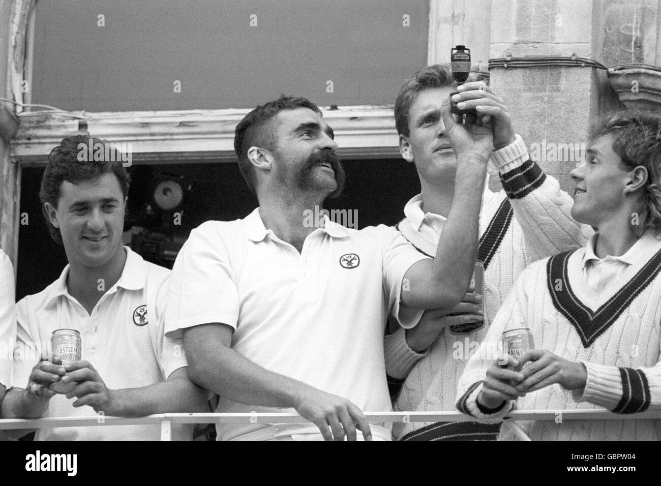 Australia's victorious cricketers celebrate after winning the sixth and ...