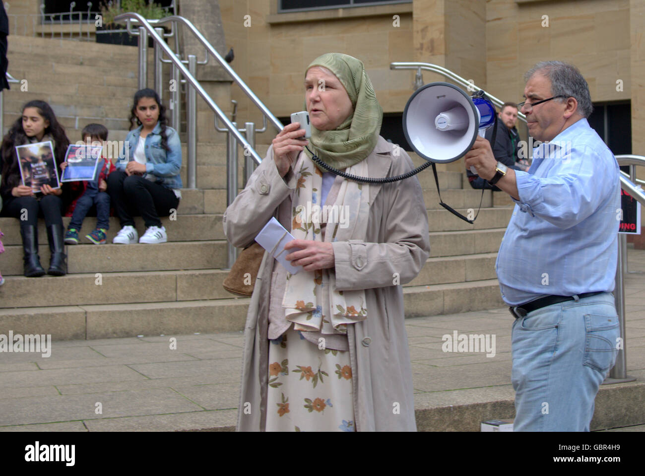 Glasgow, Scotland, UK 7th July 2016. Speaking at  Scottish Iraqi Association hold a candlelit vigil to commemorate the hundreds of innocent Iraqi civilians who lost their lives in the recent atrocious bombings in Karrada, Baghdad during the month of Ramadan and all victims of terrorist attacks and bombings around the world. Attended by local Iraqi dignitaries, as well as  Frank McAveety the leader of Glasgow district council and Humza Yousaf The Minister for Transport and the Islands in the Scottish parliament for the S.N.P. Credit:  Gerard Ferry/Alamy Live News Stock Photo