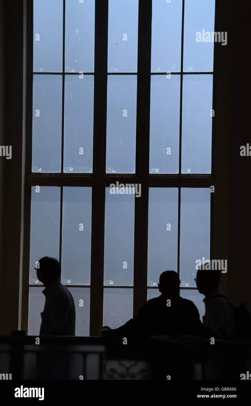 July 8, 2016 - Tokyo, Japan - The silhouette of people can be seen near the second floor of the JR Ueno station in Tokyo Japan on  July 7, 2016. Photo by: Ramiro Agustin Vargas Tabares (Credit Image: © Ramiro Agustin Vargas Tabares via ZUMA Wire) Stock Photo