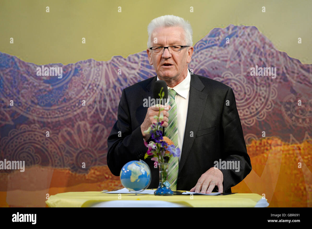 Winfried Kretschmann (Buendnis 90/Die Gruenen), premier of the German state of Baden-Wuerttemberg, speaking at the Stallwaechterparty of the Baden-Wuerrtemberg state representation in Berlin, Germany, 7 July 2016. The party traditionally takes place at the start of the parliamentary summer break. PHOTO: MAURIZIO GAMBARINI/DPA Stock Photo