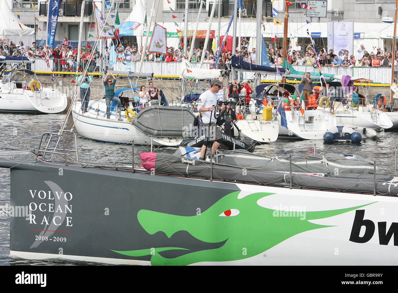 Volvo Ocean Race. Crowds cheer on the Green Dragon yacht in Galway as