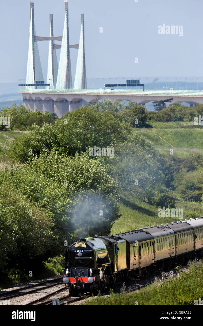 The Peppercorn class A1 Pacific 60163 Tornado, the first new mainline steam locomotive built in Britain for almost 50 years, heads towards Pilning in the West Country with the Severn Bridge in the background, on its journey from Wales hauling two special Severn Coast Express excursion trains. Stock Photo