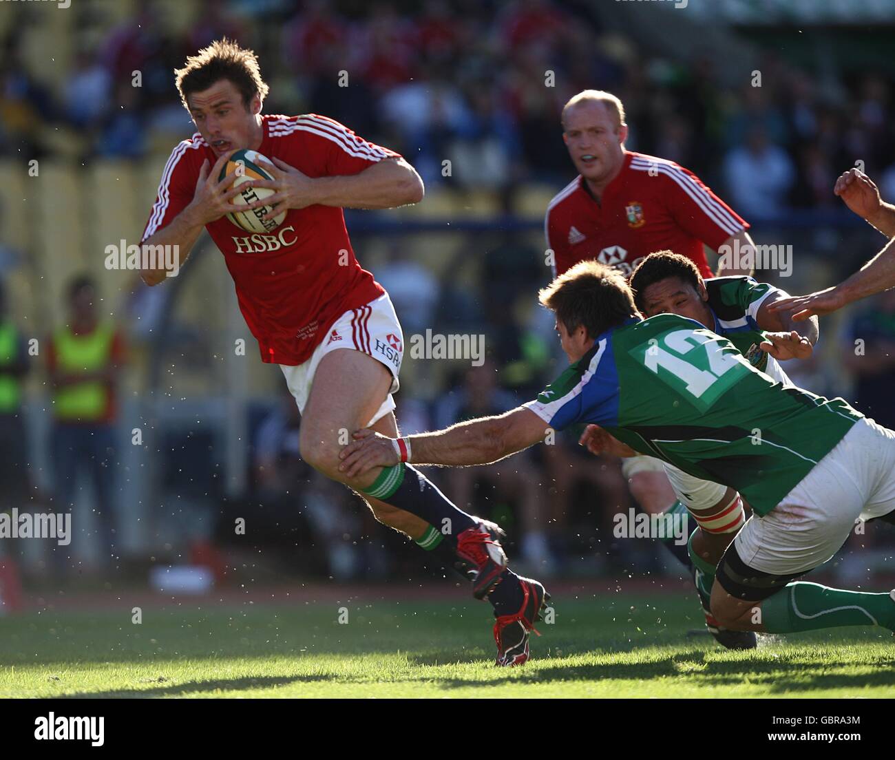 British and Irish Lions' Tommy Bowe breaks through the Royal Highfeld XV defence to score his sides first try of the game and of the tour under the posts Stock Photo