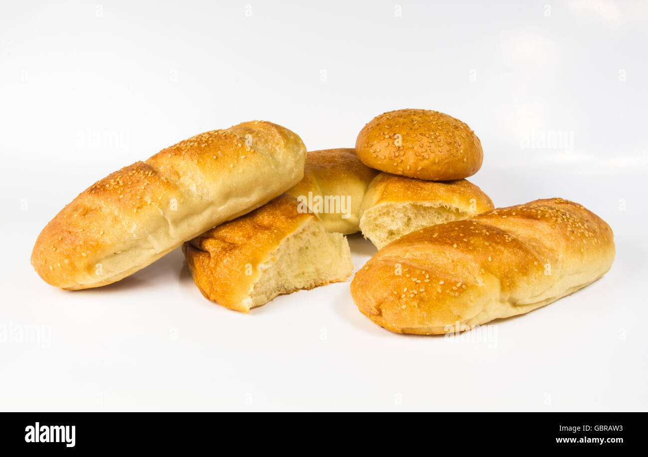 whole wheat two breads and bun on white background Stock Photo - Alamy