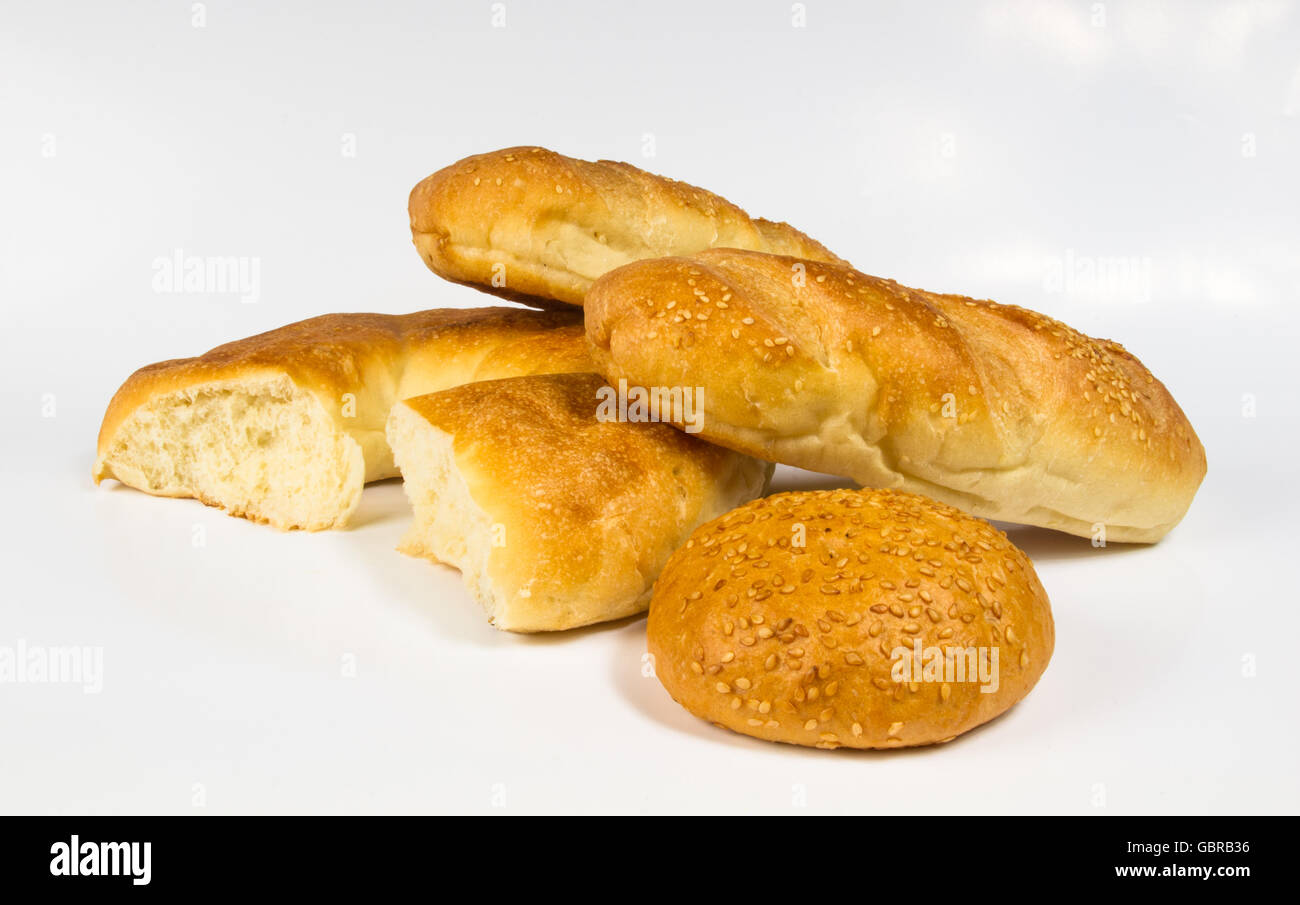 whole wheat breads and bun on white background Stock Photo - Alamy