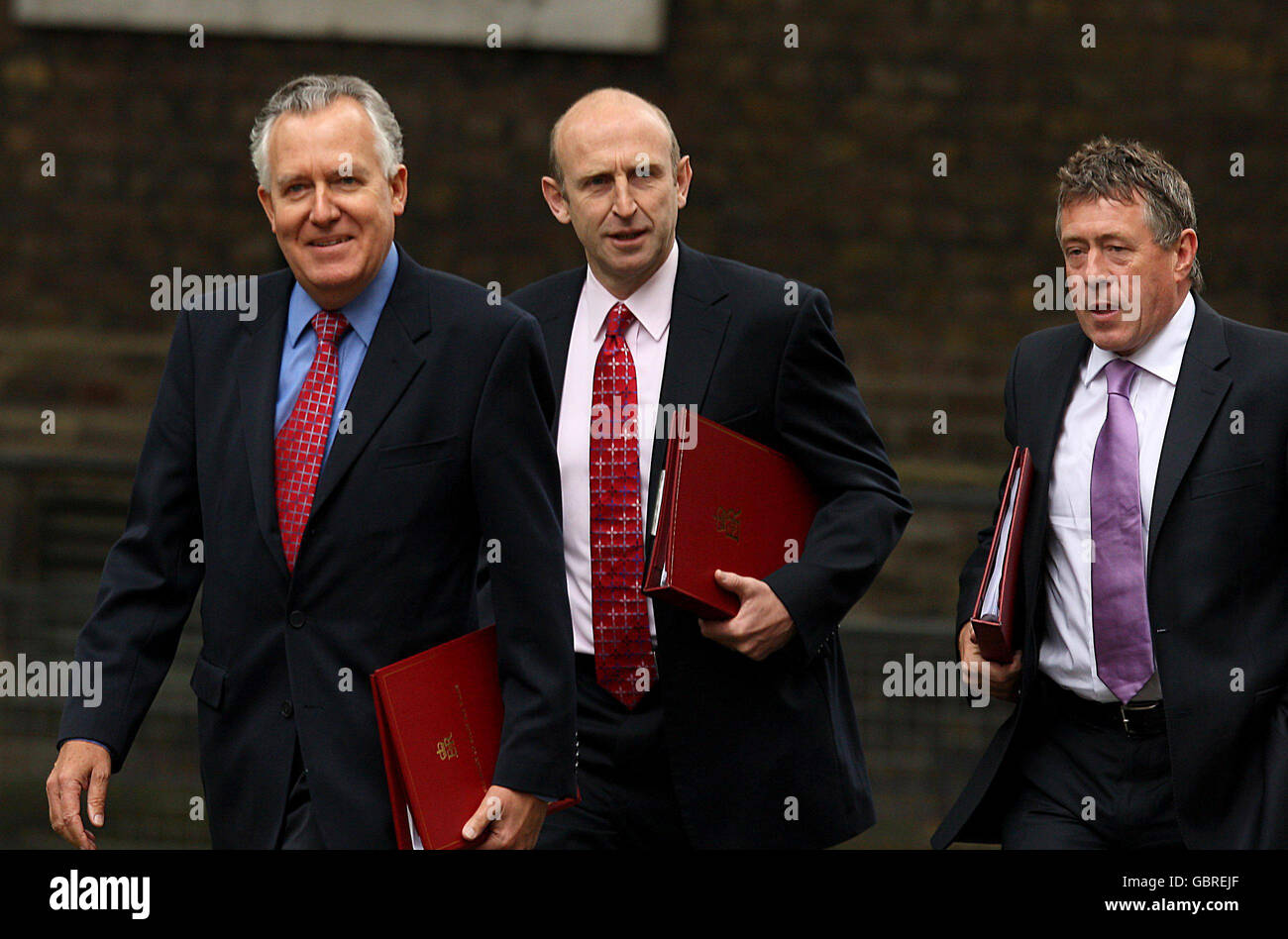 Welsh Secretary Peter Hain (left), Housing Minister for Communities and Local Government, John Healey (centre) and Secretary for Innovation, Universities and Skills John Denham arrive in Downing Street to attend the first Cabinet meeting since the reshuffle following last week's elections. Stock Photo