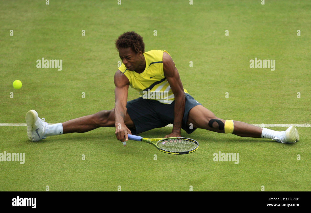 Monf France's Gael Monfils does the splits in an attempt to get the ball ...