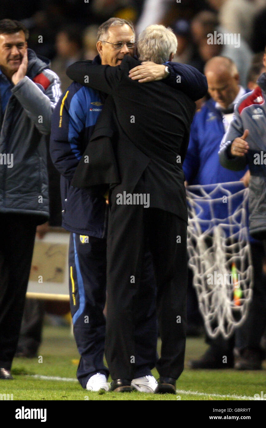 Denmark coach Morten Olsen (r) and Sweden coach Lars Lagerback embrace at  the final whistle Stock Photo - Alamy