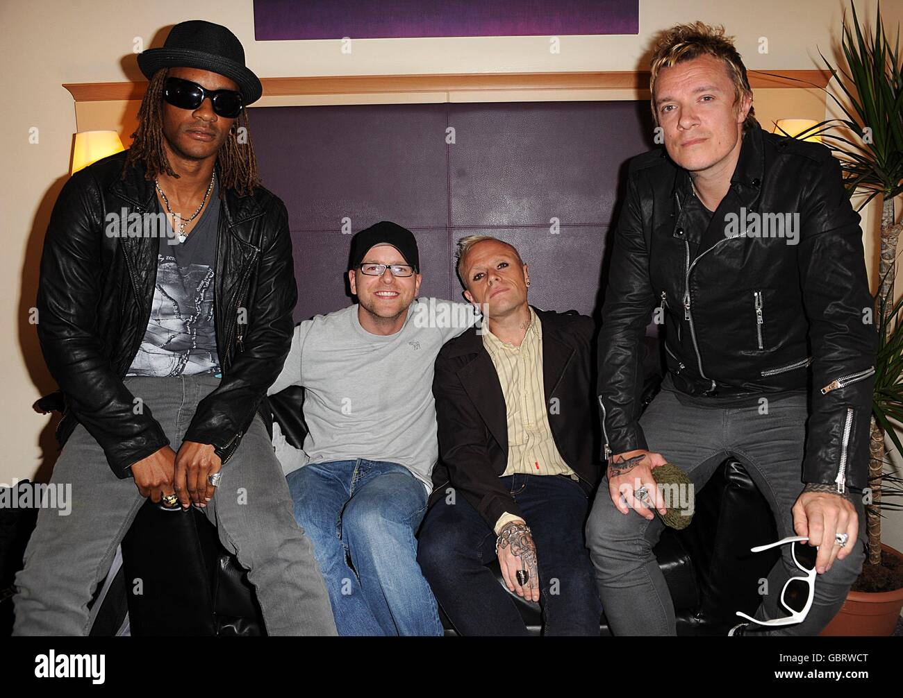 Radio DJ Ben Jones (left centre) with The Prodigy backstage at the Isle of  Wight festival, in Newport on the Isle of Wight Stock Photo - Alamy