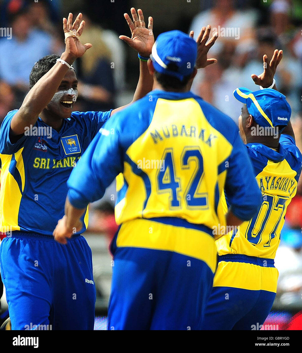 Sri Lanka's Ajantha Mendis (left) celebrates the wicket of New Zealand's Ross Taylor during the ICC World Twenty20 Super Eights match at Trent Bridge, Nottingham. Stock Photo