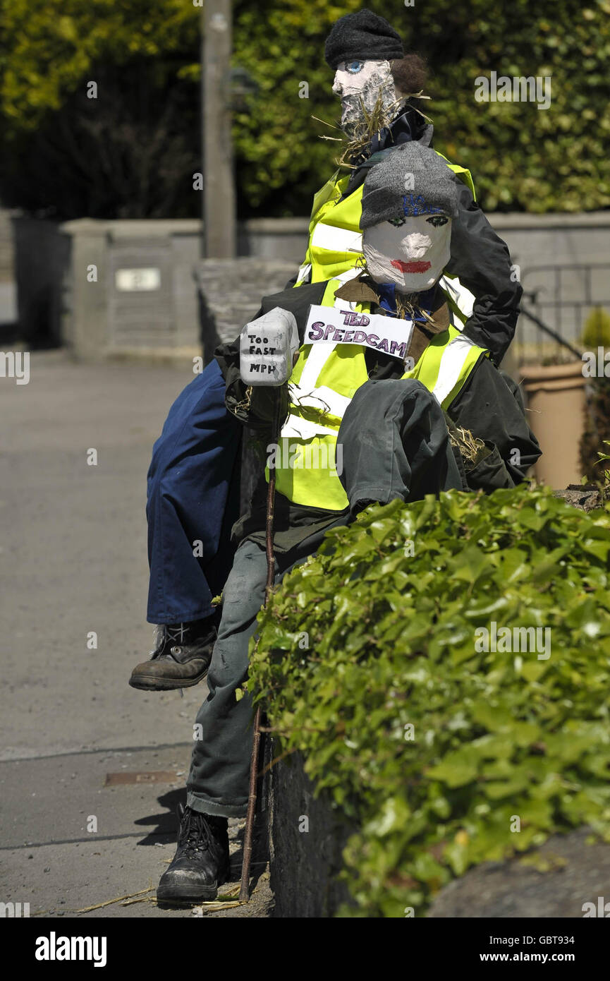 Ted and Barry the speed camera scarecrows in Glastonbury Road in Meare, Somerset. Stock Photo