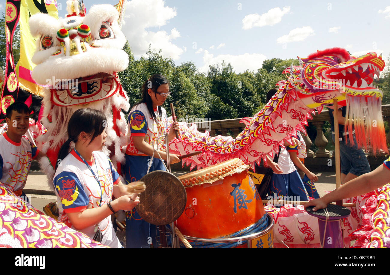 A Chinese dragon float as The West End Festival gets under way with "Scotland's Mardi Gras" where over one thousand costumed performers and bands paraded in Kelvingrove Park, Glasgow. Stock Photo