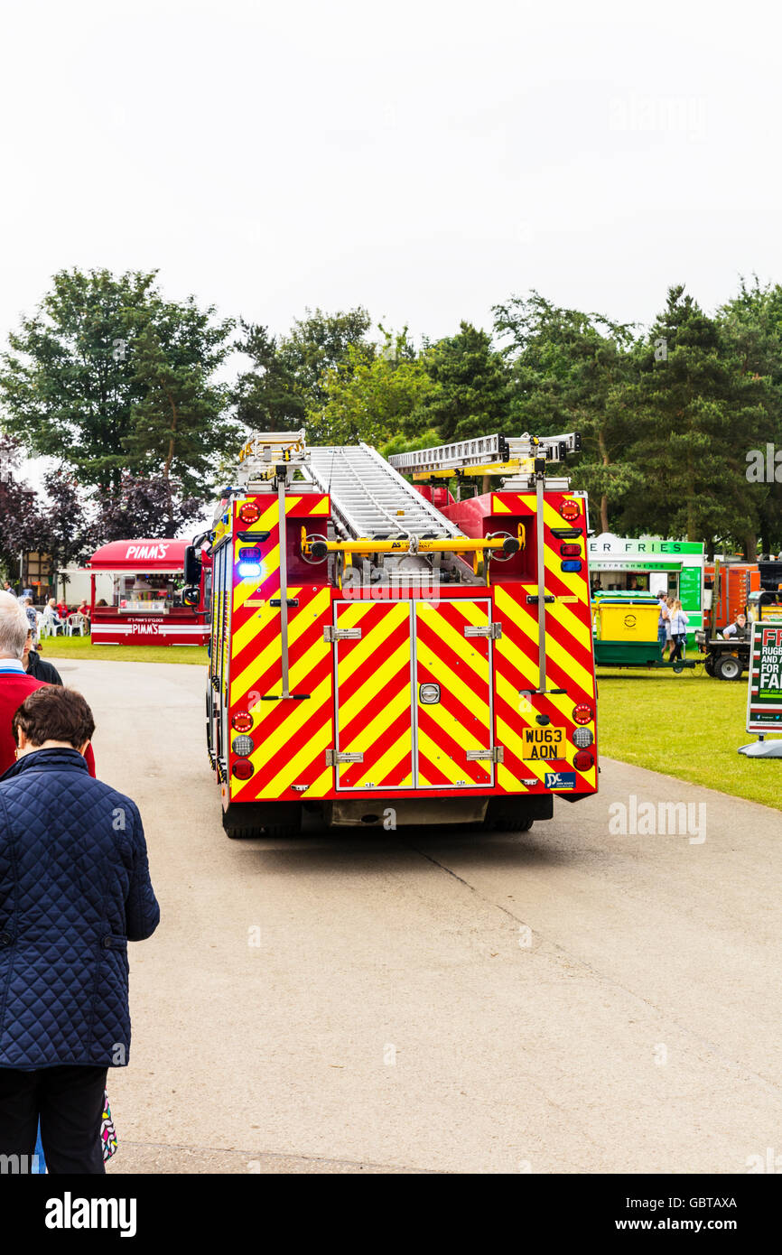 Fire engine truck lights flashing emergency vehicle responding to 999