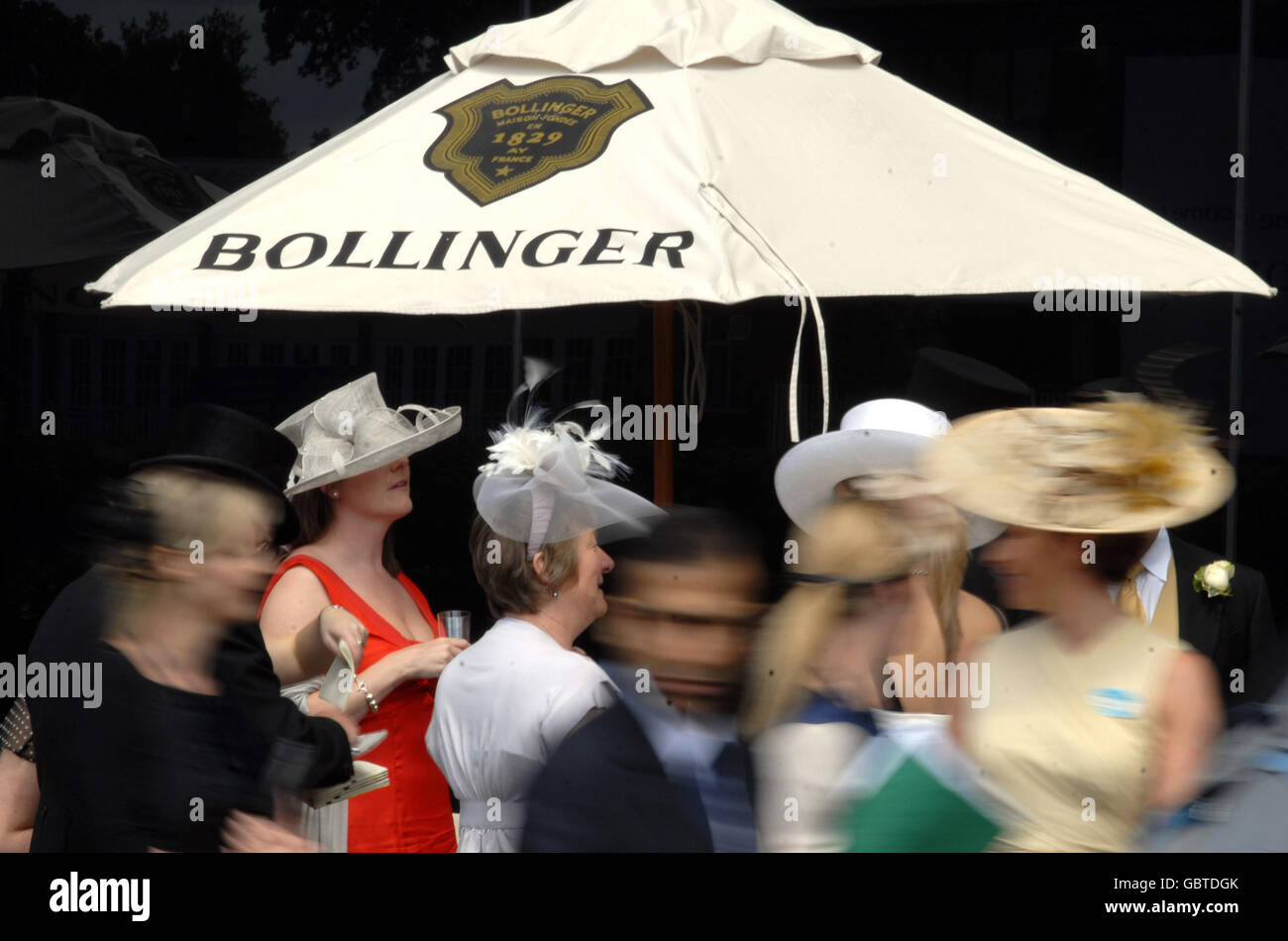 Racegoers enjoying their day during day four of The Royal Ascot at Ascot Racecourse, Berkshire. Stock Photo