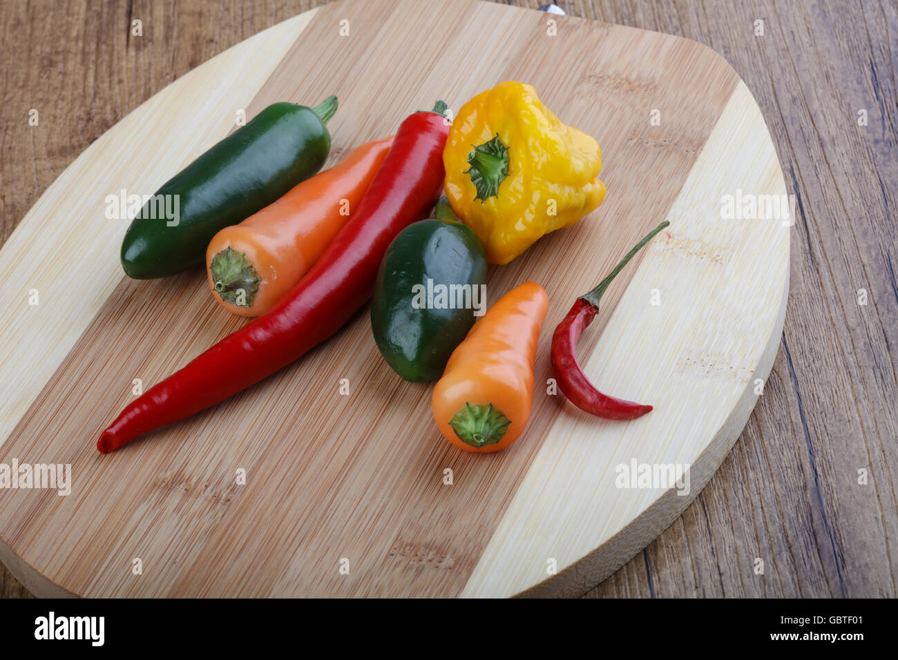 Pepper mix on the wood background Stock Photo