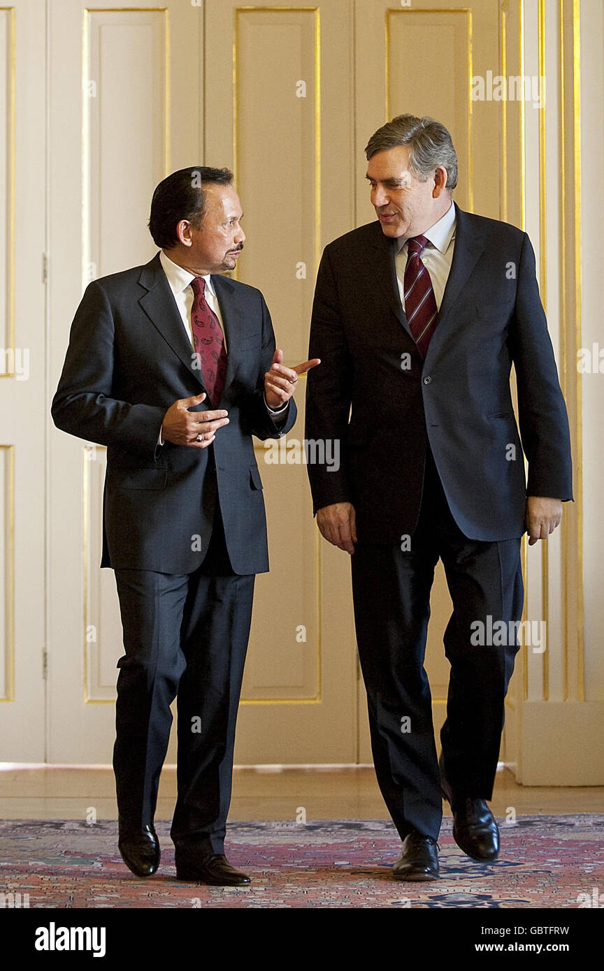 Britain's Prime Minister Gordon Brown, right, with the Sultan of Brunei, Hassanal Bolkiah, following a meeting to sign the Brunei Garrison Agreement, at 10 Downing Street, in central London. Stock Photo