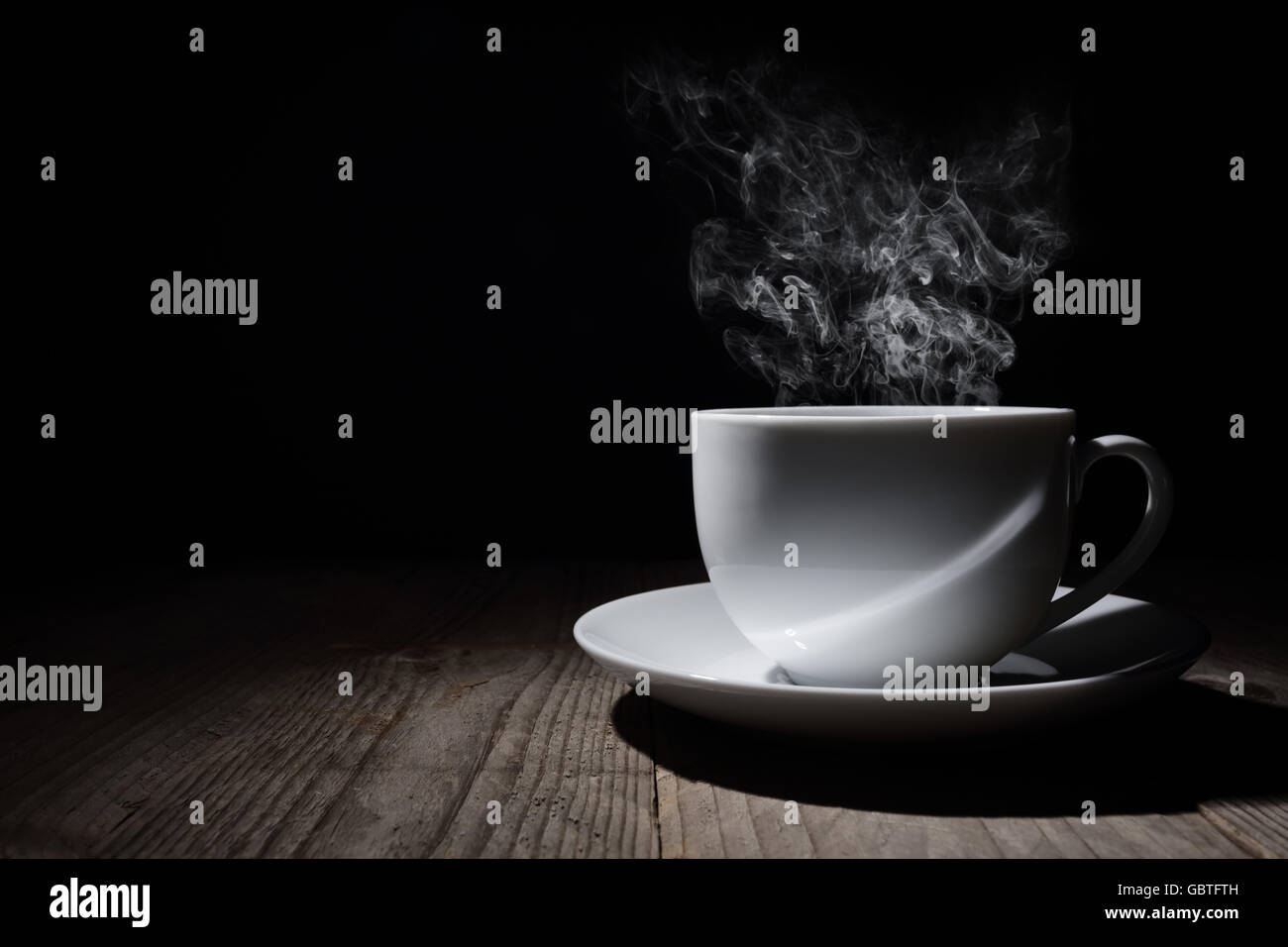 Hot cup of coffee or tea with steam and copy space Stock Photo