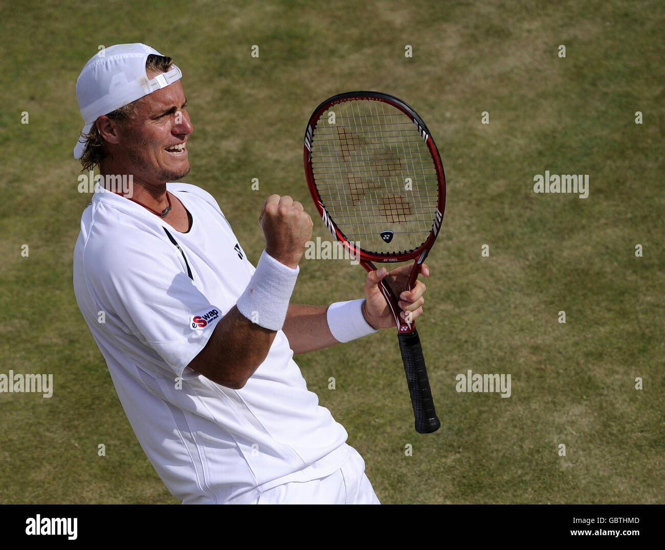 Lleyton hewitt celebrates his victory hi-res stock photography and