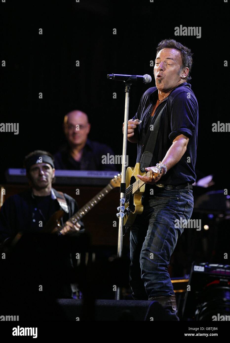 Bruce Springsteen and the E Street band performing during the 2009 Glastonbury Festival at Worthy Farm in Pilton, Somerset. Stock Photo