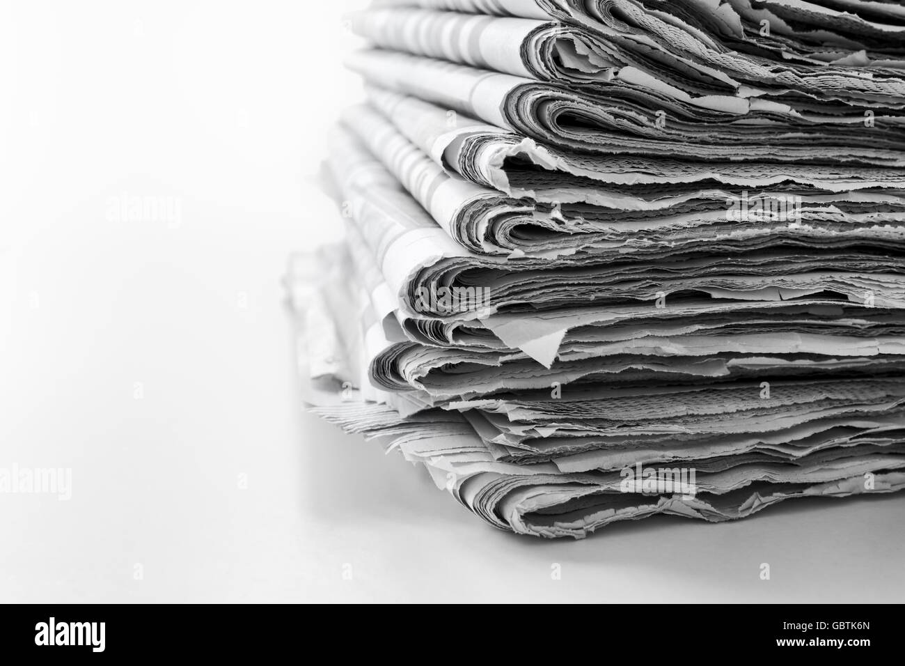 Newspapers folded and stacked concept for global communications and the media Stock Photo