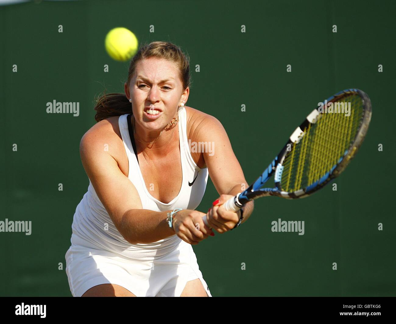 Australia's Sally Peers in action in her Girls' Singles Second Round match against Great Britain's Laura Robson during the Wimbledon Championships 2009 at the All England Tennis Club in Wimbledon. Stock Photo