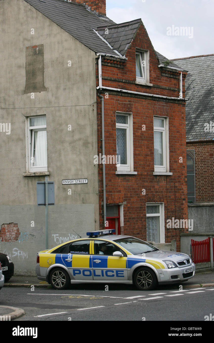 A police car outside a house in East Belfast which is the latest to be attacked in a spate of racist attacks against Romanian Families in the city. Stock Photo