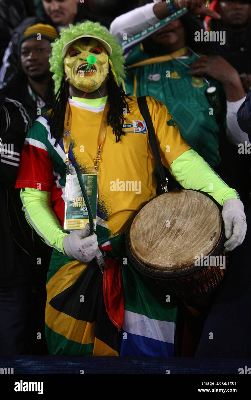 A fan in fancy dress in the stands hi res stock photography and