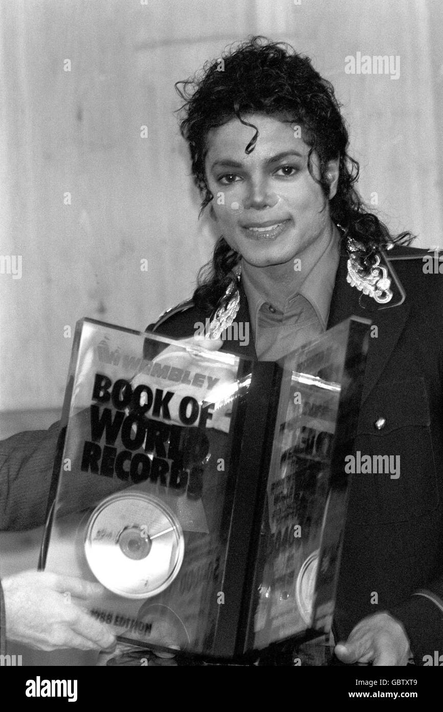 Pop star Michael Jackson at the Mayfair Hotel, with a special award to mark the singer's seven sell-out shows at Wembley during his UK tour. Stock Photo