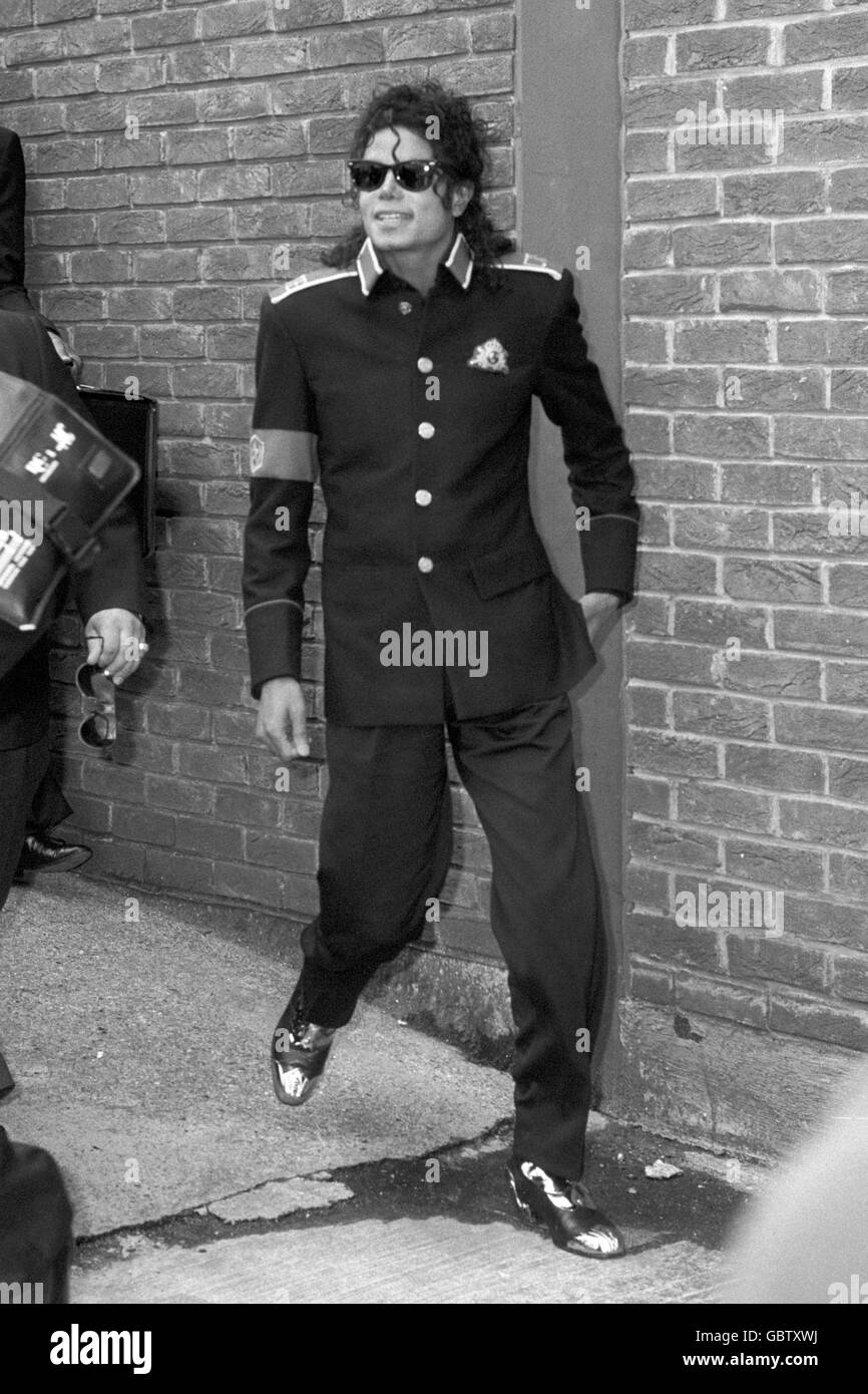 Pop star Michael Jackson arrives at Heathrow Airport amid tight security for the start of his British tour. Stock Photo