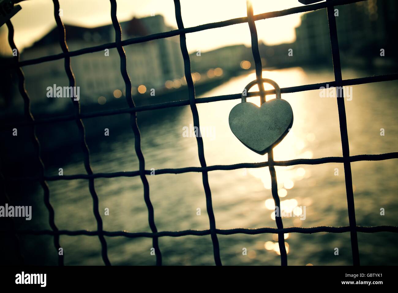 Love padlock on the railing of a bridge, Berlin, Germany Stock Photo