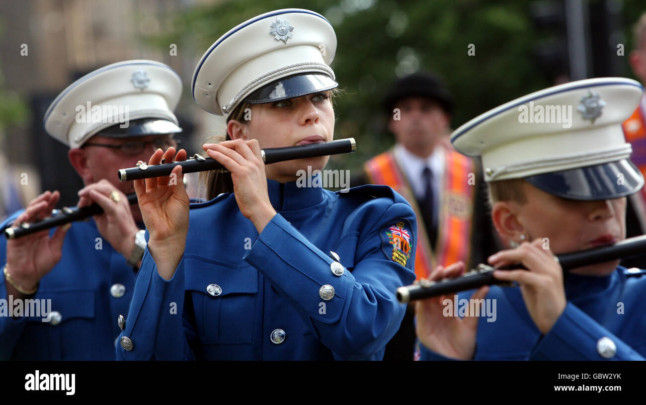 Annual Orange Walk in Glasgow. Marchers during the annual Orange Walk in Glasgow. Stock Photo