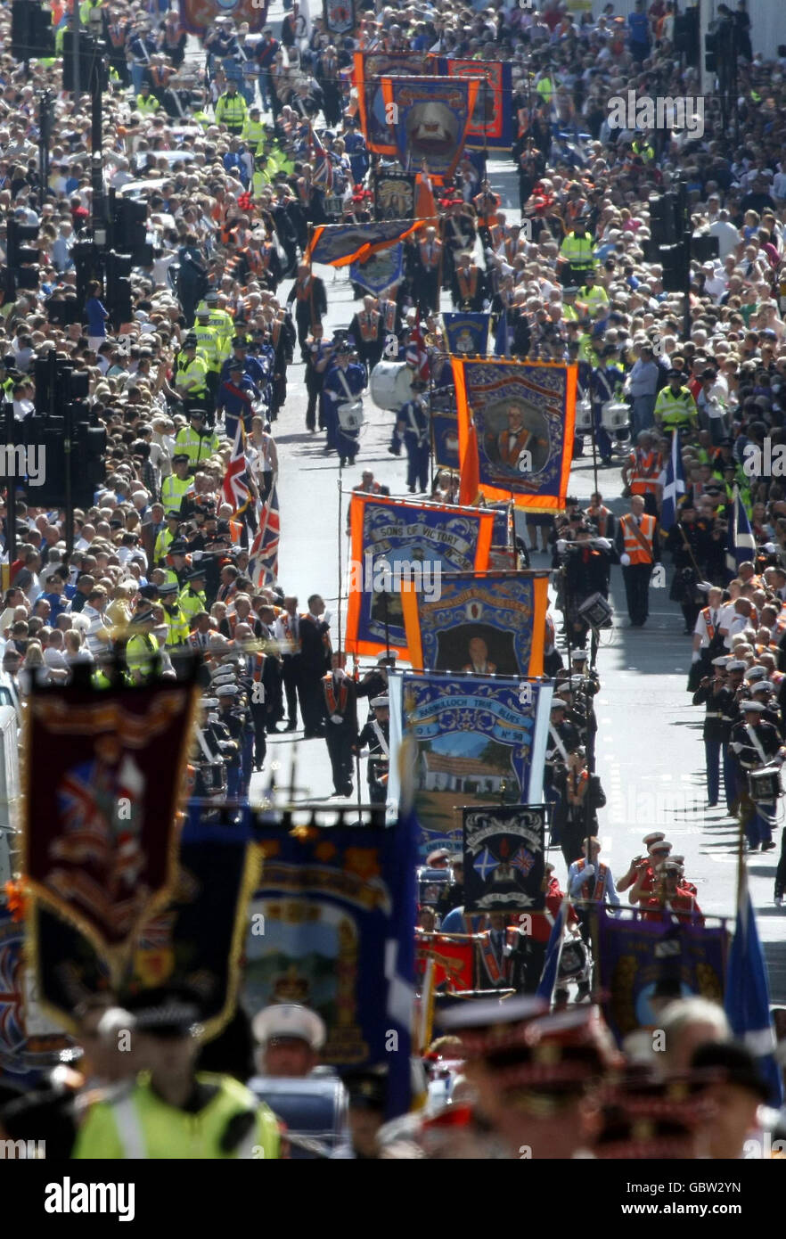 Annual Orange Walk in Glasgow. Marchers during the annual Orange Walk in Glasgow. Stock Photo