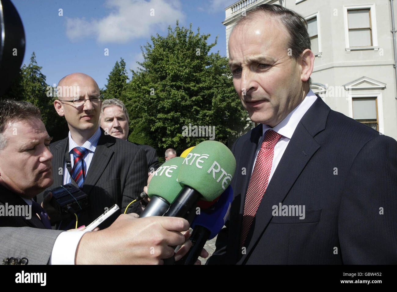 Minister for Foreign Affairs Michael Martin speaks to the media as he arrives for the latest North South Ministerial Council meeting at Farmleigh House in Dublin. Stock Photo