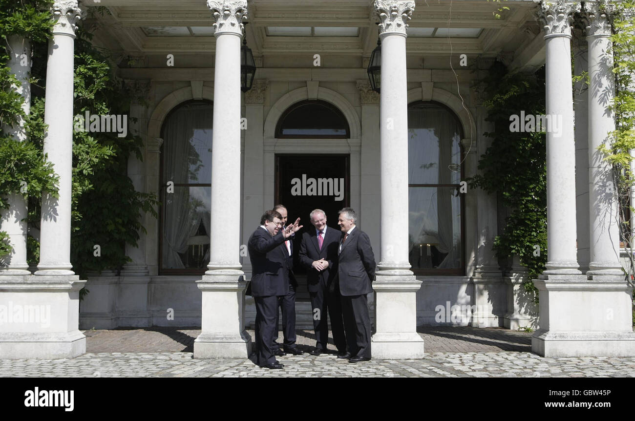 Left to right. Taoiseach Brian Cowen, Minister for Foreign Affairs Michael Martin, Northern Ireland Deputy First Minister Martin McGuinness and First Minister Peter Robinson arrive for the latest North South Ministerial Council meeting at Farmleigh House in Dublin. Stock Photo