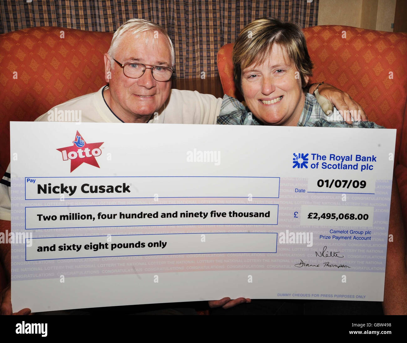 Battling cancer mum scoops 2.49M lottery win Stock Photo
