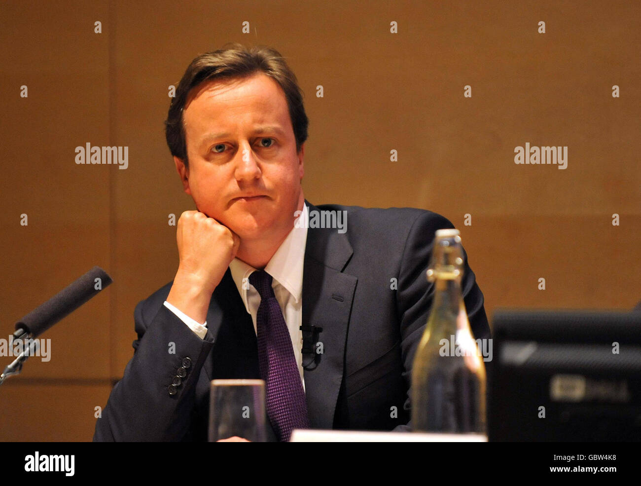 Conservative Party leader David Cameron addresses the Reform think-tank pledging to cut the number of quangos - starting with communications regulator Ofcom, at the Clifford Chance building, in London Docklands. Stock Photo