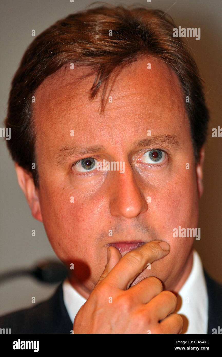 Cameron vows to cut quangos Stock Photo