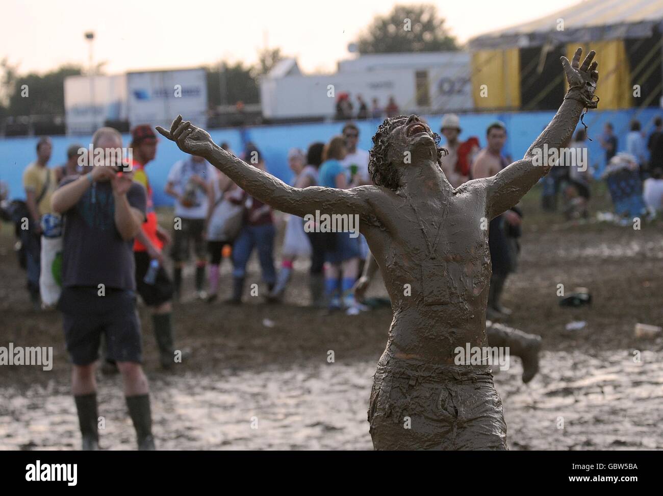 Covered in mud glastonbury hi-res stock photography and images - Alamy