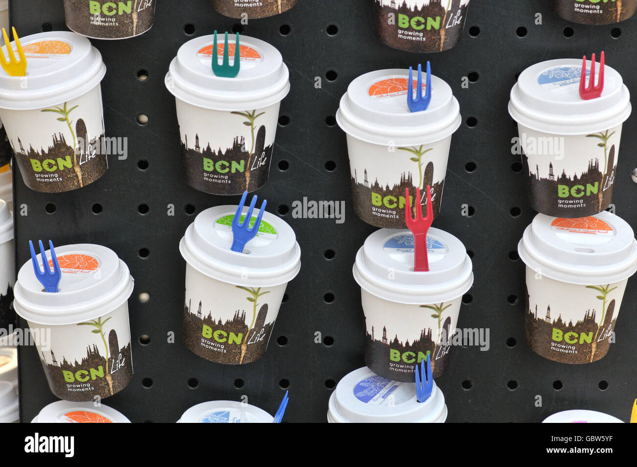 Plastic cups with seeds and substrate, Souvenirs , Barcelona, Catalonia ...