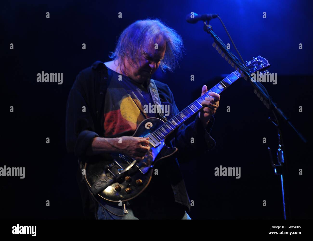 Neil Young performing on the Pyramid Stage during the 2009 Glastonbury Festival at Worthy Farm ...