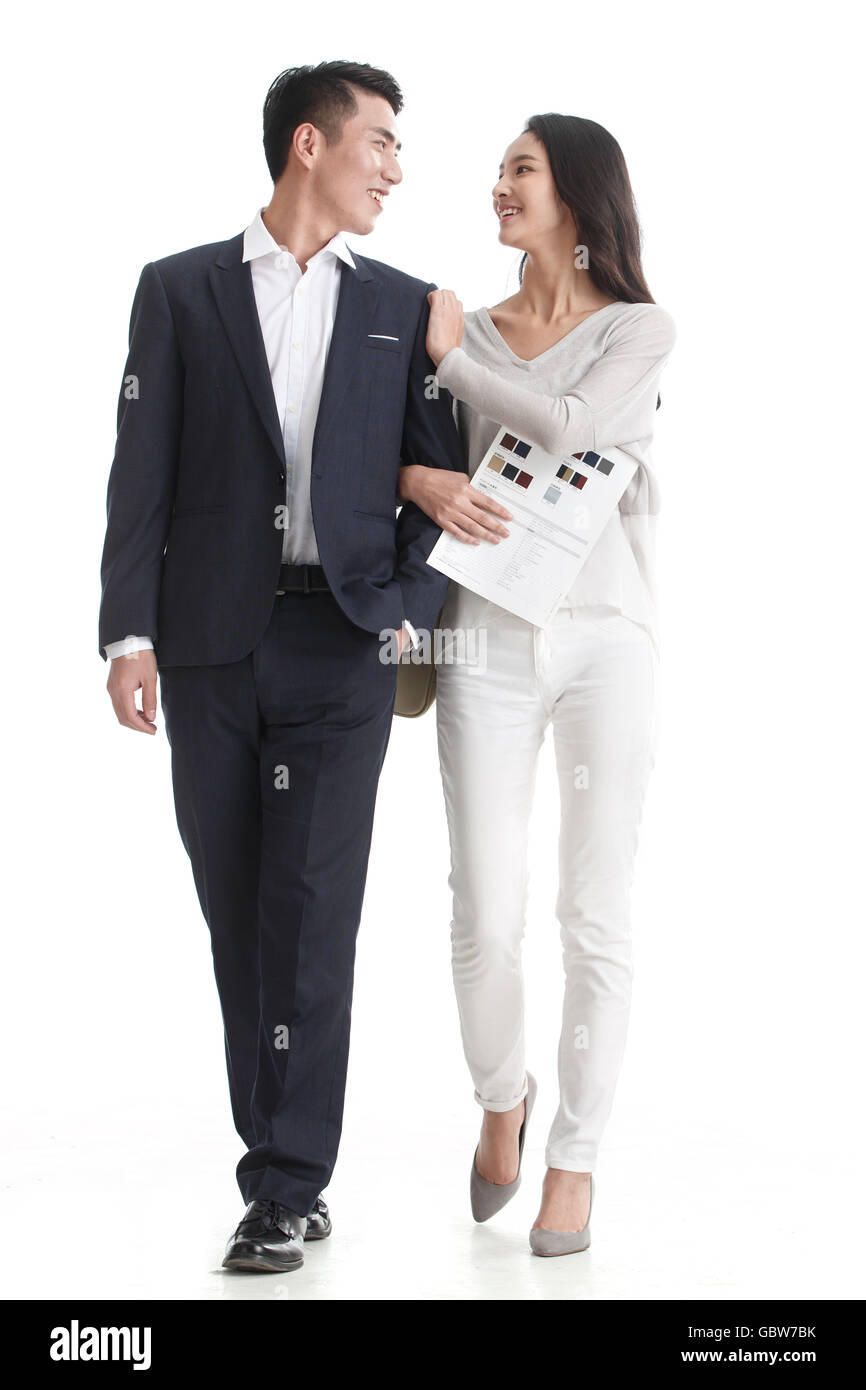 The young couple to Car Buying Stock Photo