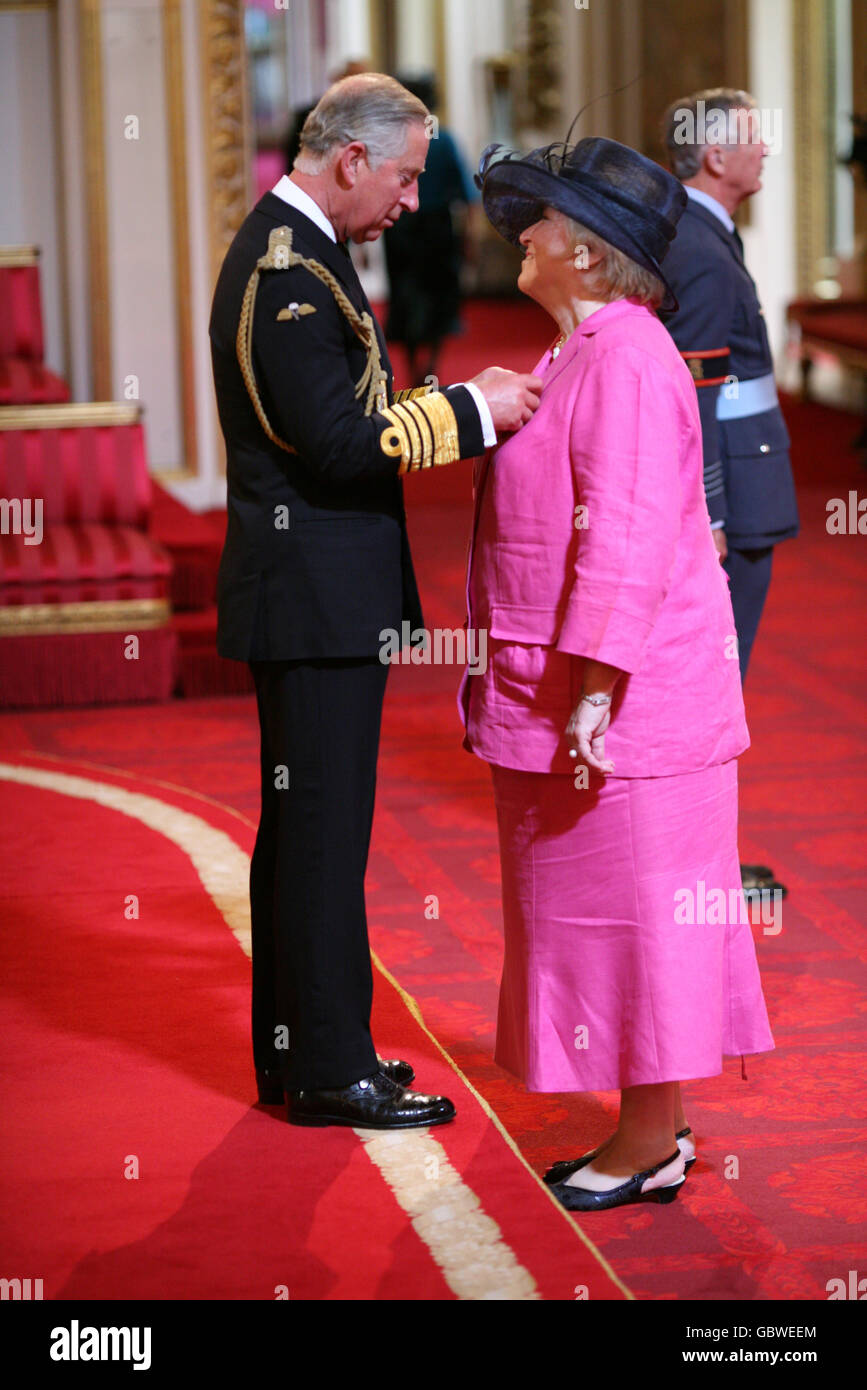 Miss Leslie Dillingham from London is made an MBE by the Prince of