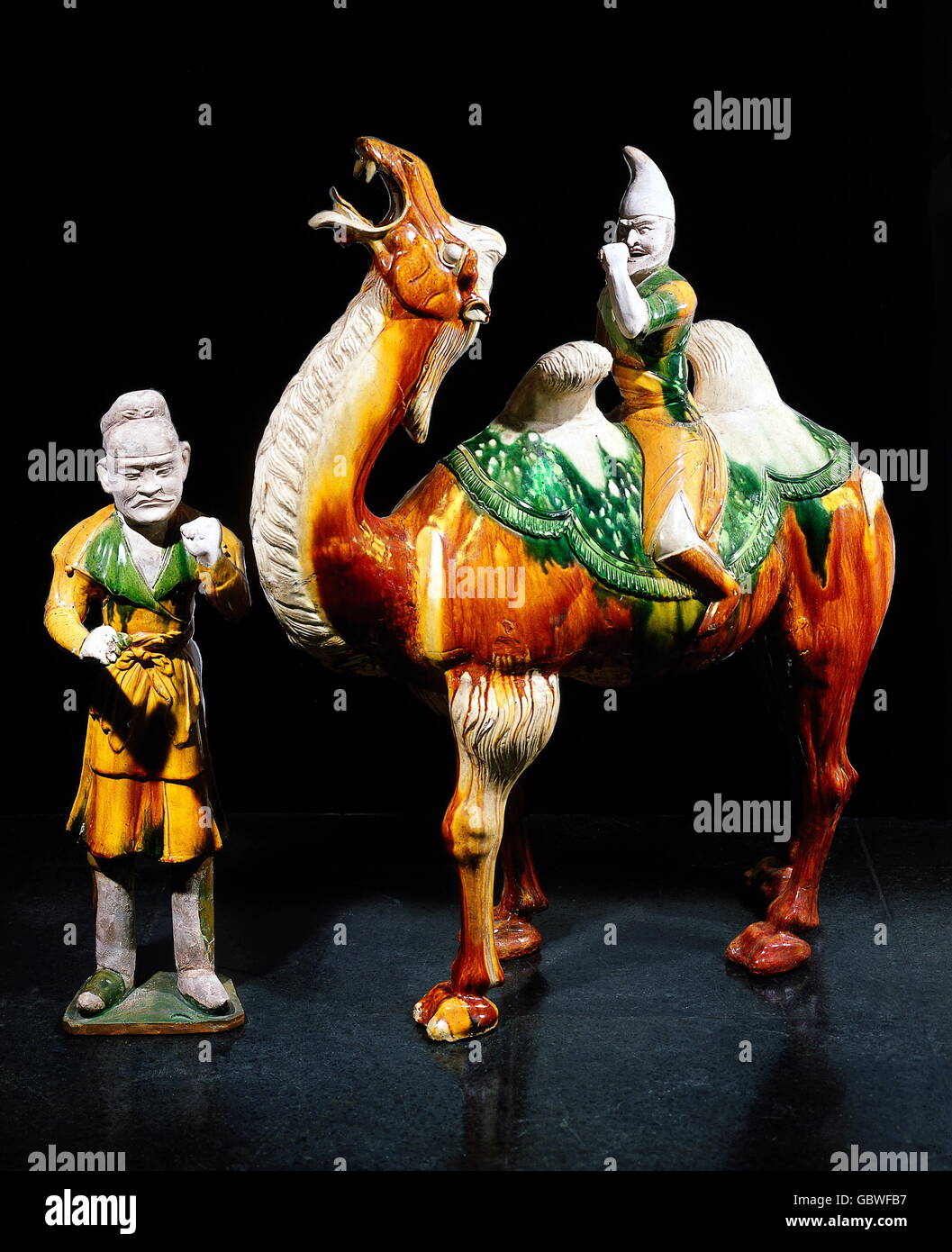 fine arts, China, ceramic, cameleer and camel guide, fired white clay with glaze, 87 and 67 centimeter high, Tang Dynasty (618 - 906), Ethnological Museum Berlin, Stock Photo